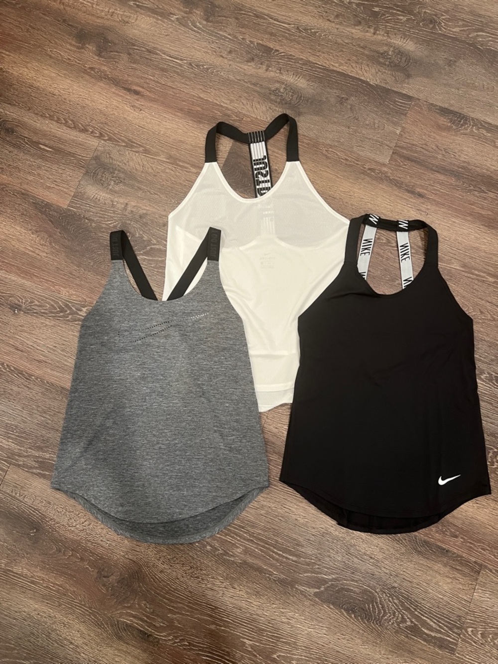3 Nike Women’s open-back Tank Tops – Black, White & Gray - XS